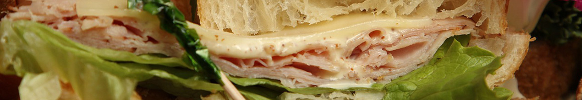 Eating Sandwich at Tummy's Sub Shop restaurant in Rio Linda, CA.